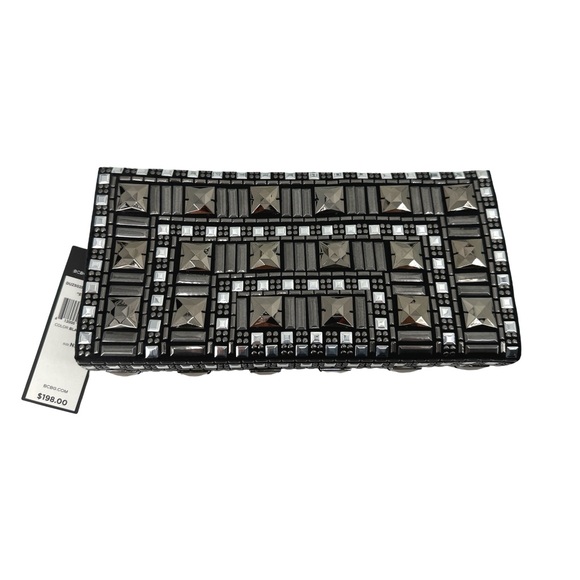BCBGMAXAZRIA Clutches and evening bags for Women | Online  New with tags! BCBG Runway black clutch with metallic embellishments beads.